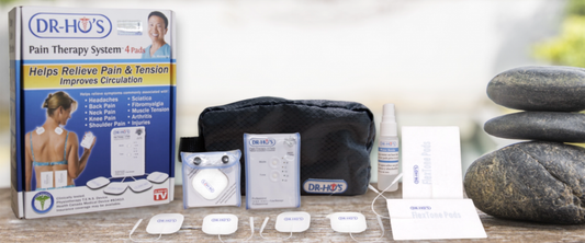 Fotografía del contenido de la caja del DR. HO’S® PAIN THERAPY SYSTEM.