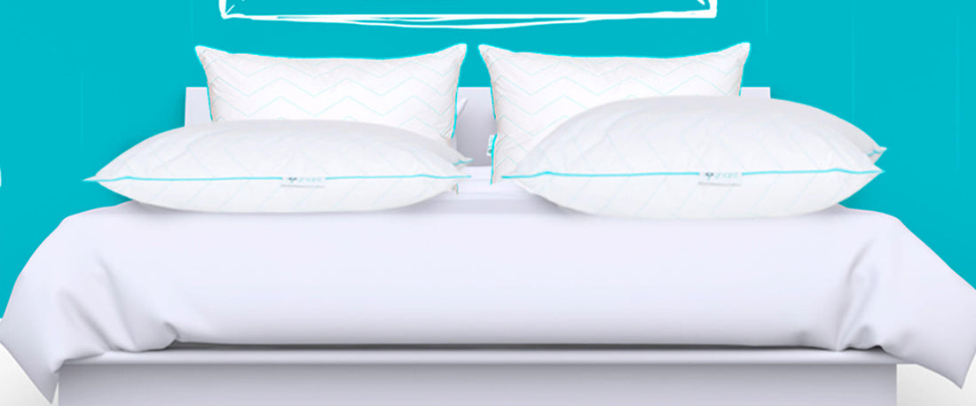 Imagen de una cama con Almohadas Sognare encima.