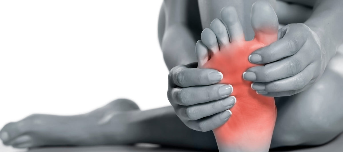 Mujer con dolor de pies